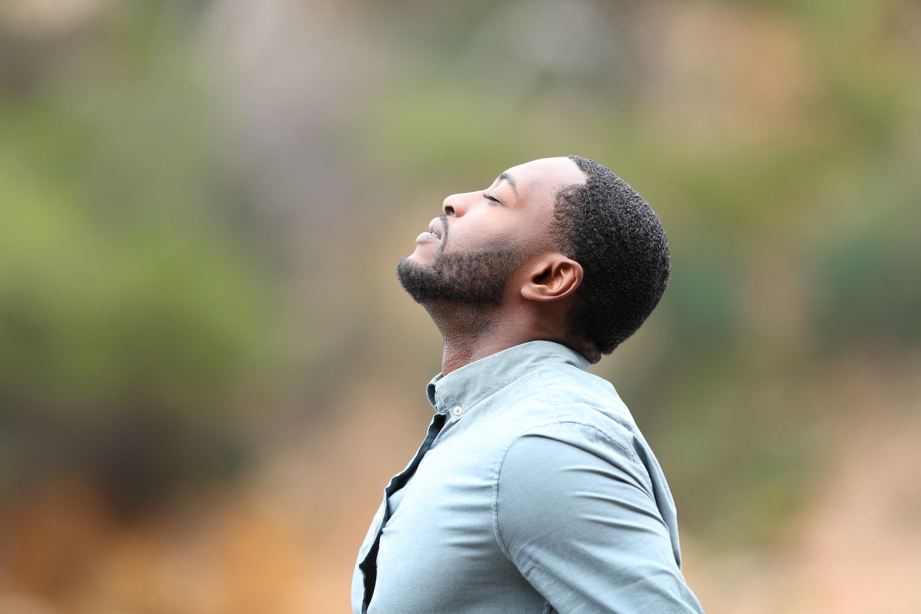 man using breathing as a tool to deal with anxiety during the holidays