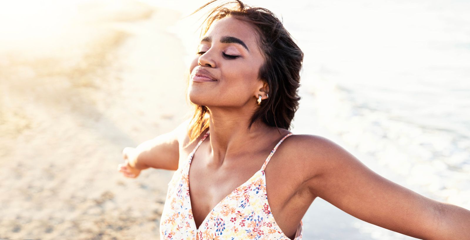 Free happy woman with open arms enjoying nature - Joyful black girl outdoors breathing fresh air - Enjoyment, freedom, happiness and mental health concept